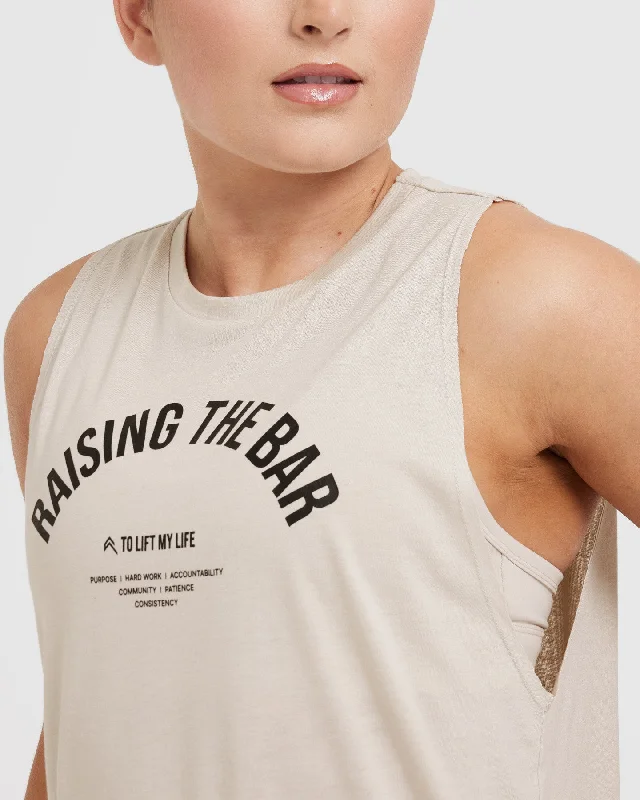 Raising The Bar Graphic Unisex Muscle Vest | Sand